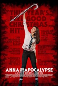 A young woman in a school uniform holds a large candy cane weapon above her head against a red background with reviews; text reads "Anna and the Apocalypse: An Alternative Christmas Movie—A Zombie Christmas Musical.