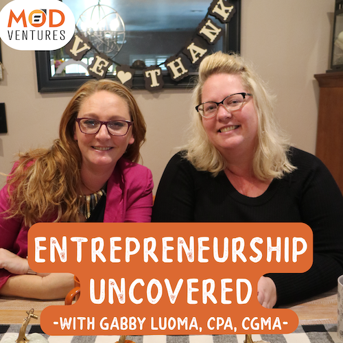 Two women smile at a table beneath a "Love & Thank" banner. Text reads: "Entrepreneurship Uncovered with Gabby Luoma, CPA, CGMA," highlighting expertise in Accounting and MOD Ventures LLC in the corner.