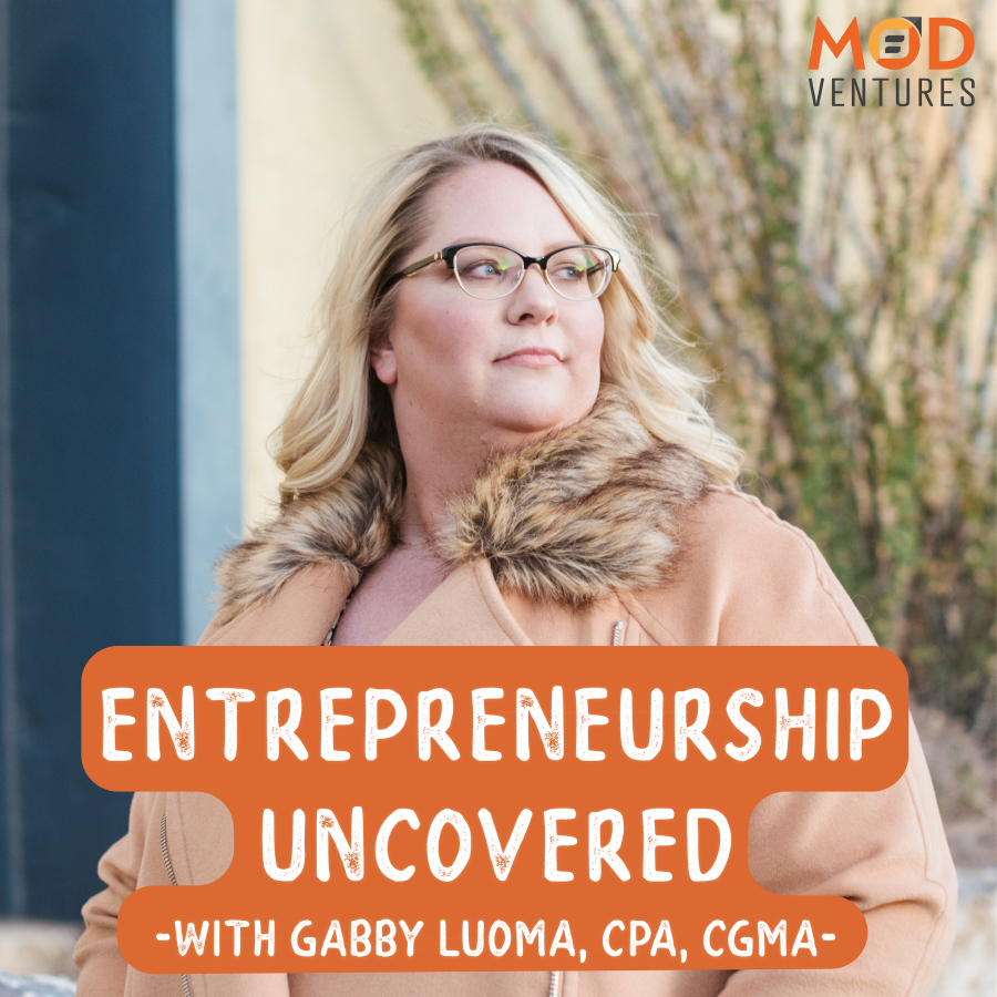 A woman wearing glasses and a tan coat stands outdoors. Text on the image reads: “Entrepreneurship Uncovered with Gabby Luoma, CPA, MOD Ventures LLC.” Perfect for those interested in accounting and business insights.