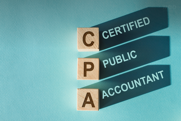 Three wooden blocks with the letters C, P, and A cast shadows with the words "Certified," "Public," and "Accountant" on a blue background—a nod to CPA-led firms that help 7-figure businesses thrive.